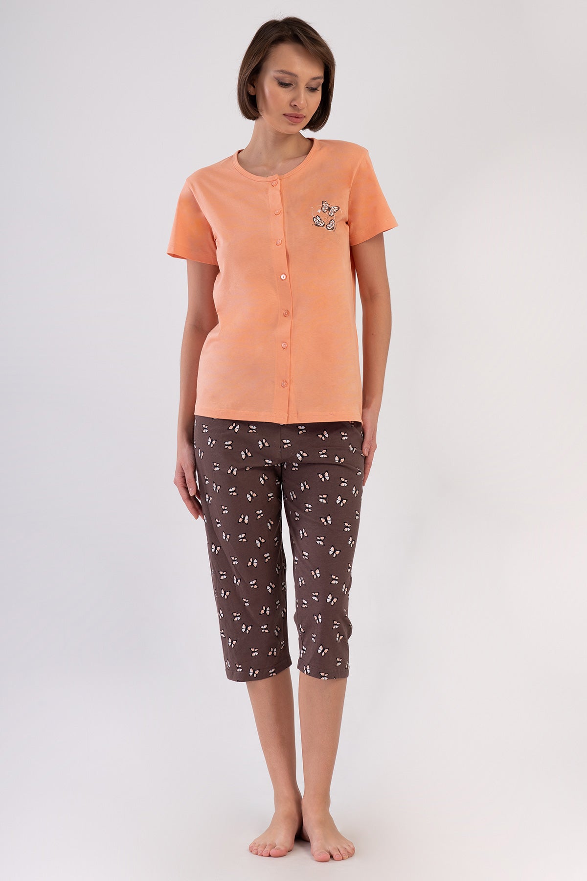 KADIN P.SUPREM TAMAMI DUGMELI KISA KOL KAPRI TAKIM