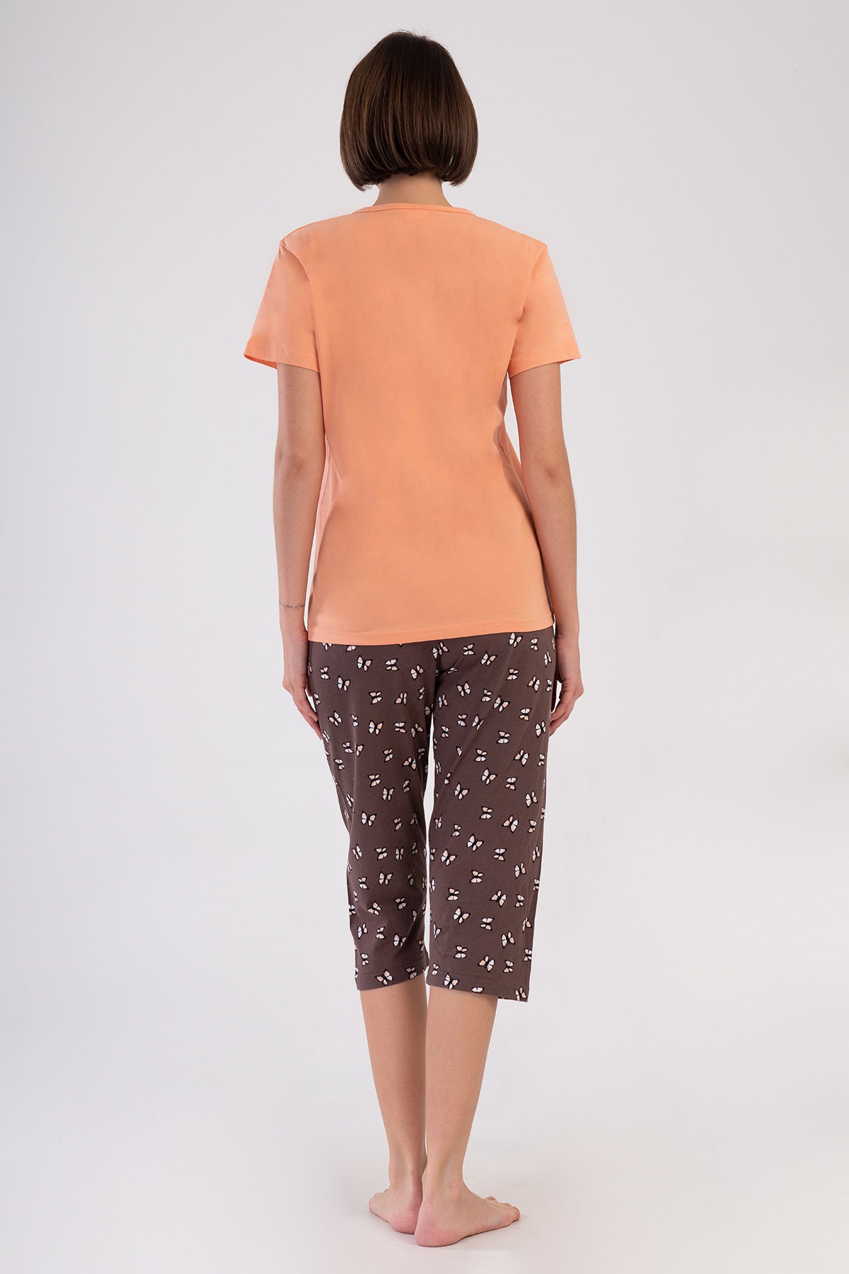 KADIN P.SUPREM TAMAMI DUGMELI KISA KOL KAPRI TAKIM