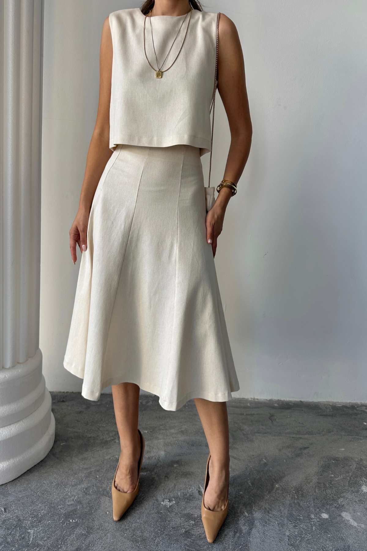 GABARDİN KOLSUZ BLUZ - PARÇALI ÇAN ETEK TAKIM - Bej